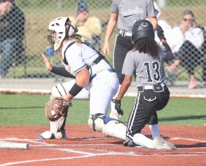 Boonville freshman catcher Jaden Ronnfeldt prepares for a close play at the plate against Centralia in the first game of the Boonville Lady Pirates JV Softball Tournament Saturday at the Boonville High School Ball Field. The Lady Pirates finished 0-2 in the tournament losing to Centralia 14-7 and St. Elizabeth 13-9. (Photo by Chris Bowie)